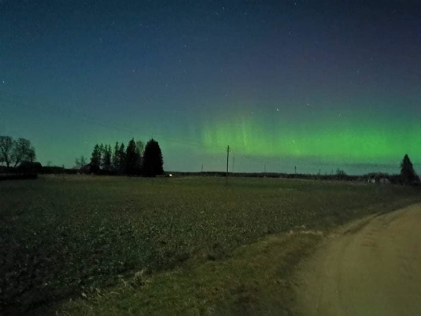 Северное сияние подбирается к границе Беларуси